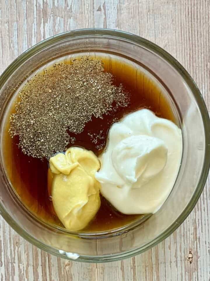 ingredients in one bowl for vegan honey mustard dressing