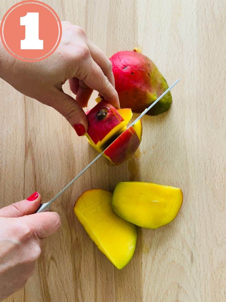 step 1 How to cut a mango; slicing the sides vertically