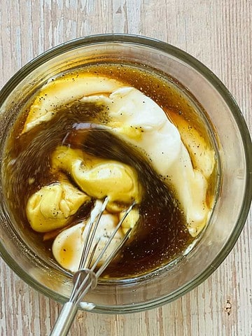 stirring ingredients for vegan honey mustard dressing