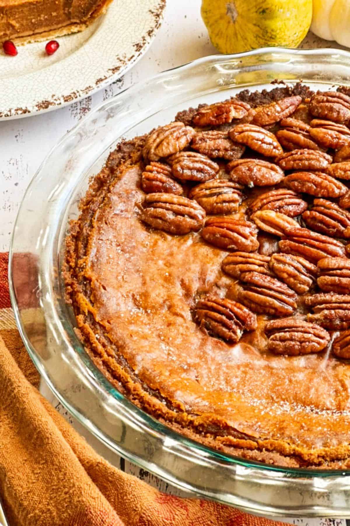 Pumpkin Pie with Graham Cracker Crust Pie topped with candied pecans