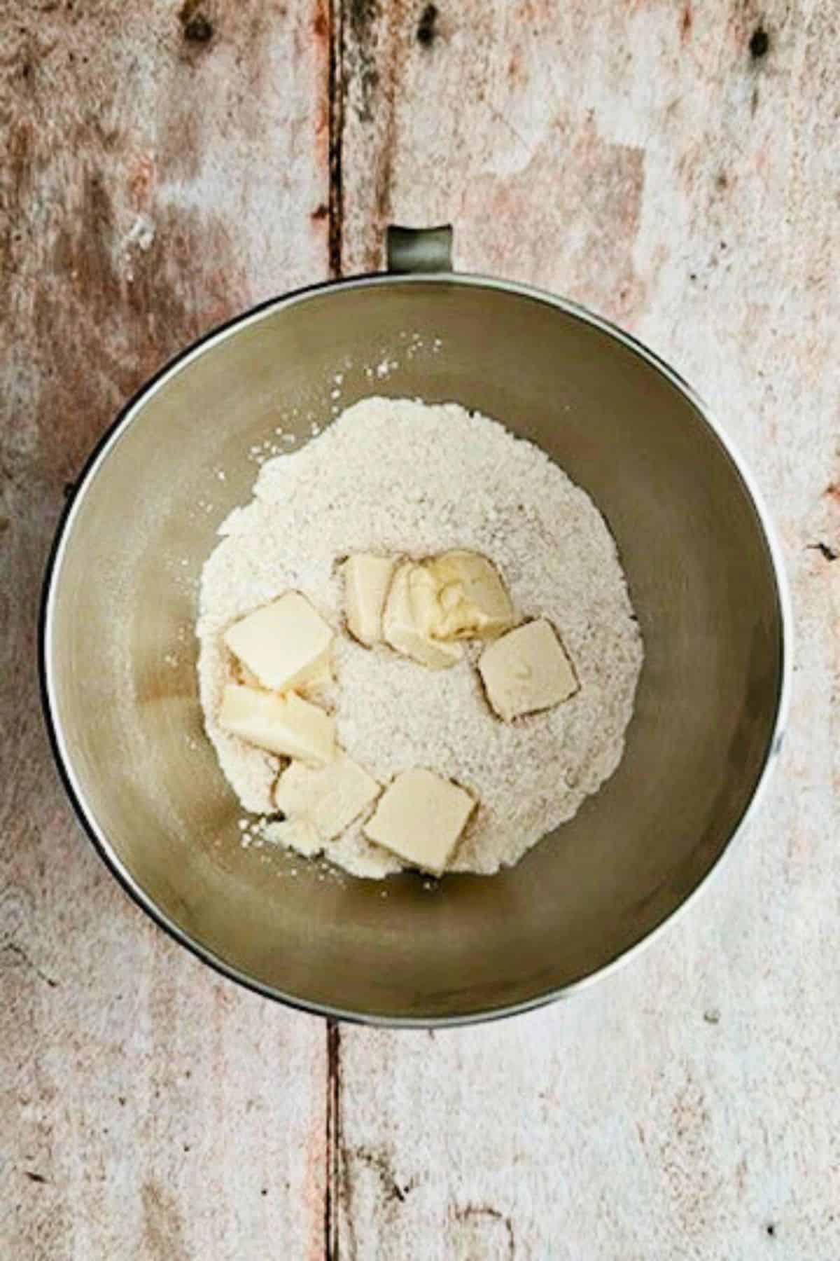 adding butter in mixture for coffee cake cookies in mixer