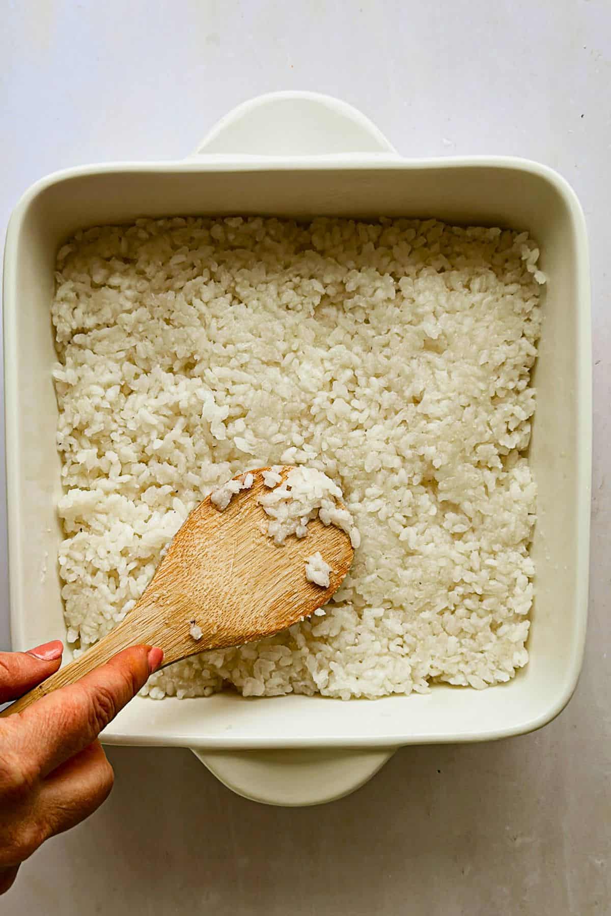 adding first layer of rice