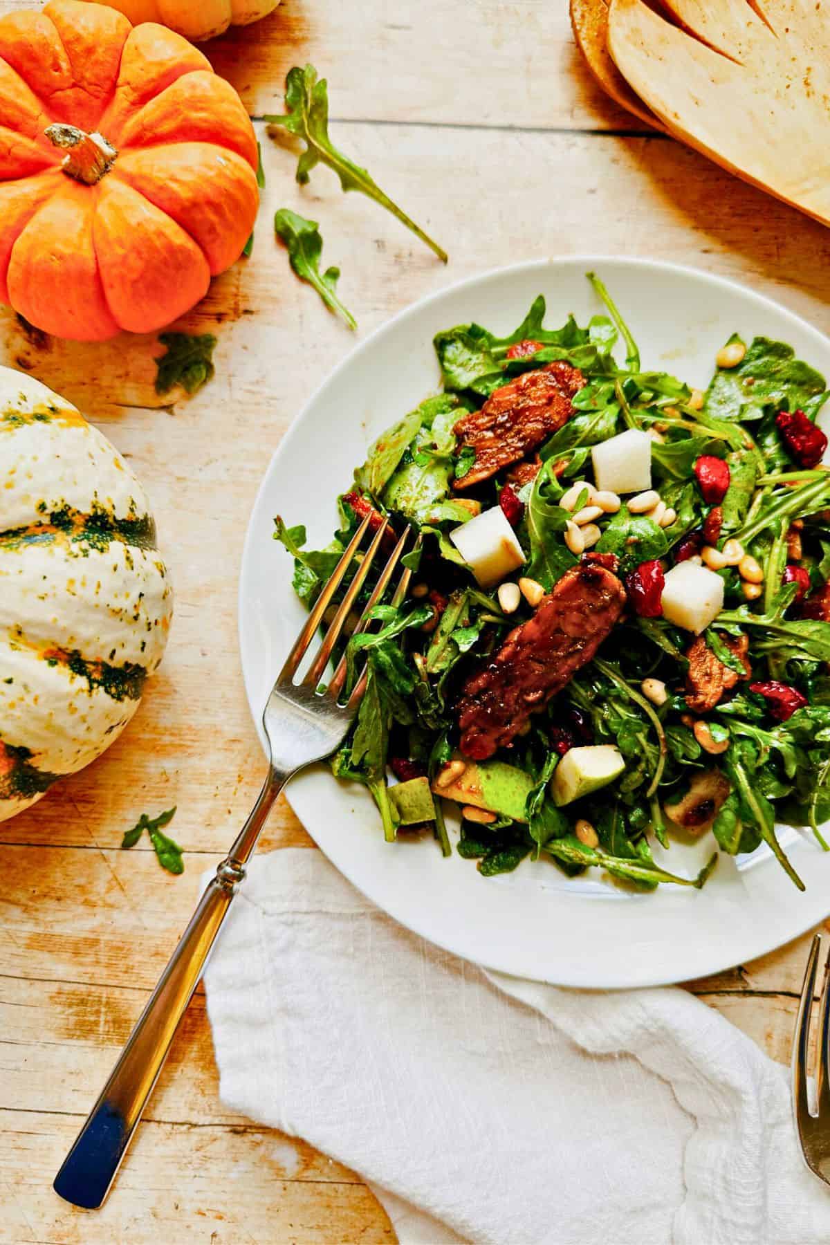 arugula salad with pumpkin vinaigrette on a plate (3)