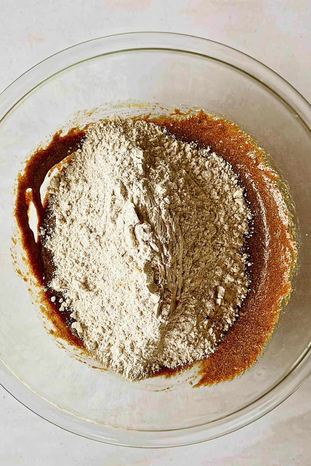 combining ingredients for soft vegan gingerbread cookies dough