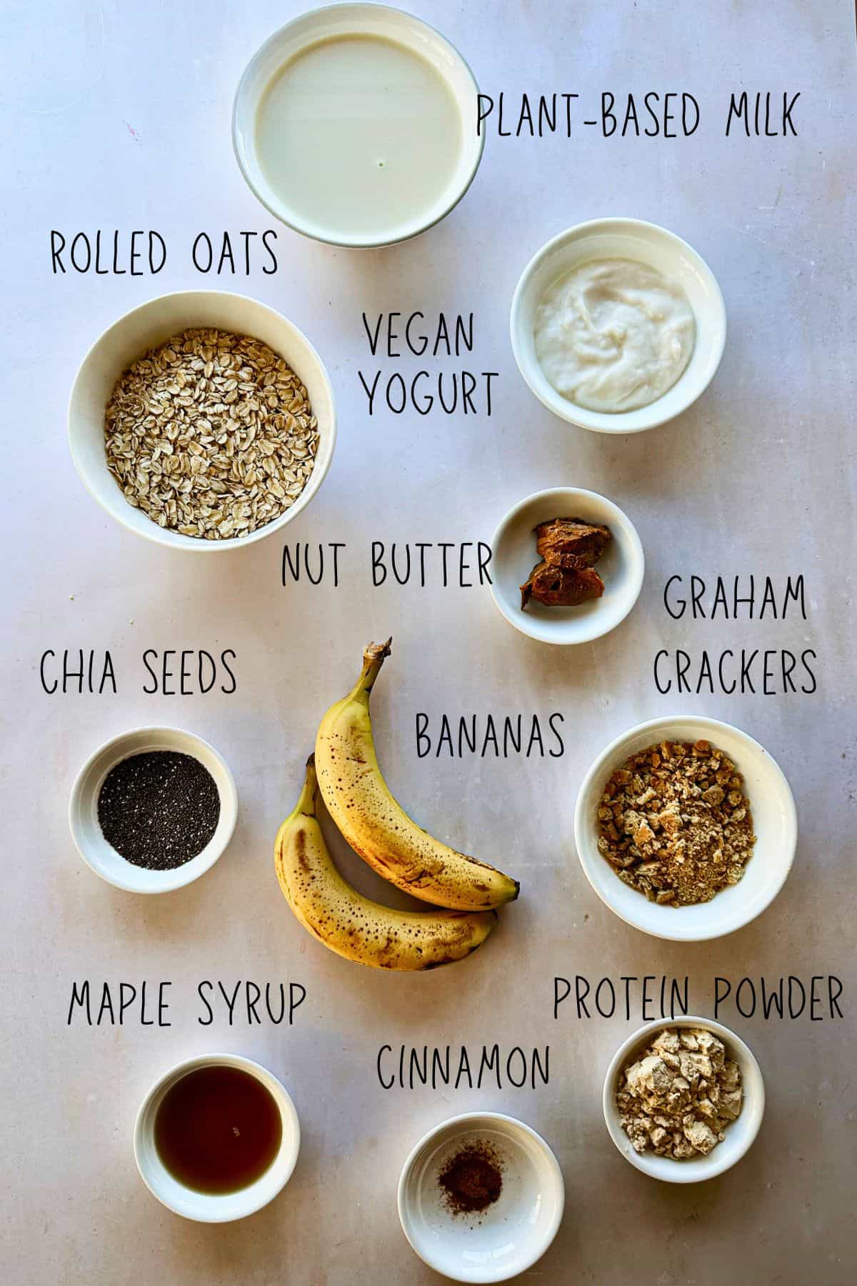 top view of high protein vegan banana cream pie overnight oats ingredients