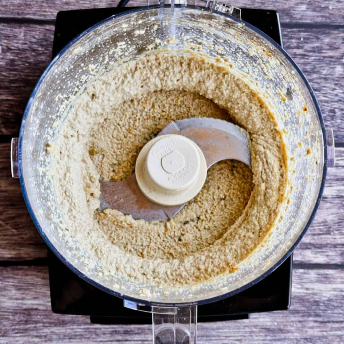 processed hummus in a food processor