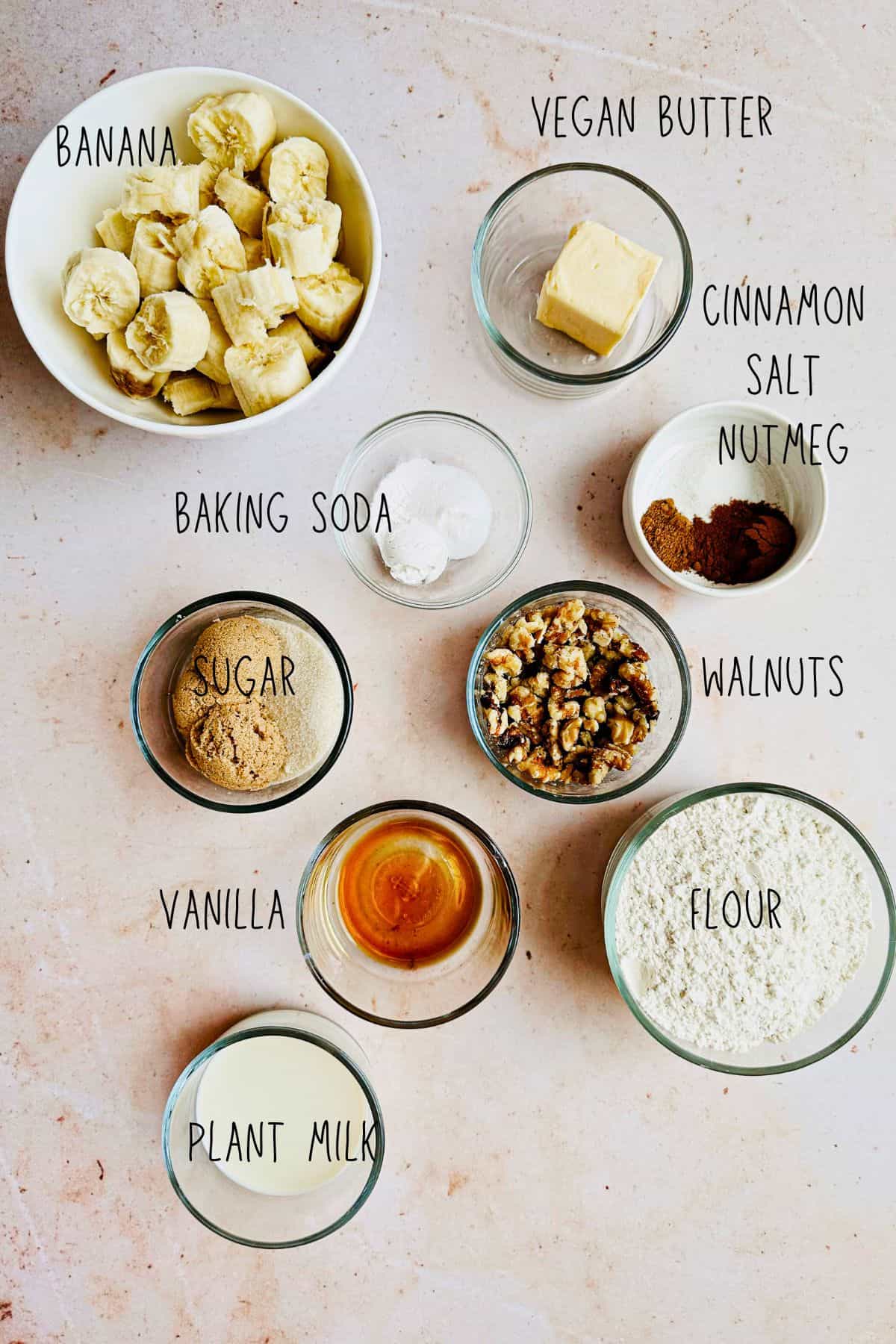 ingredients for vegan banana bread top view in bowls
