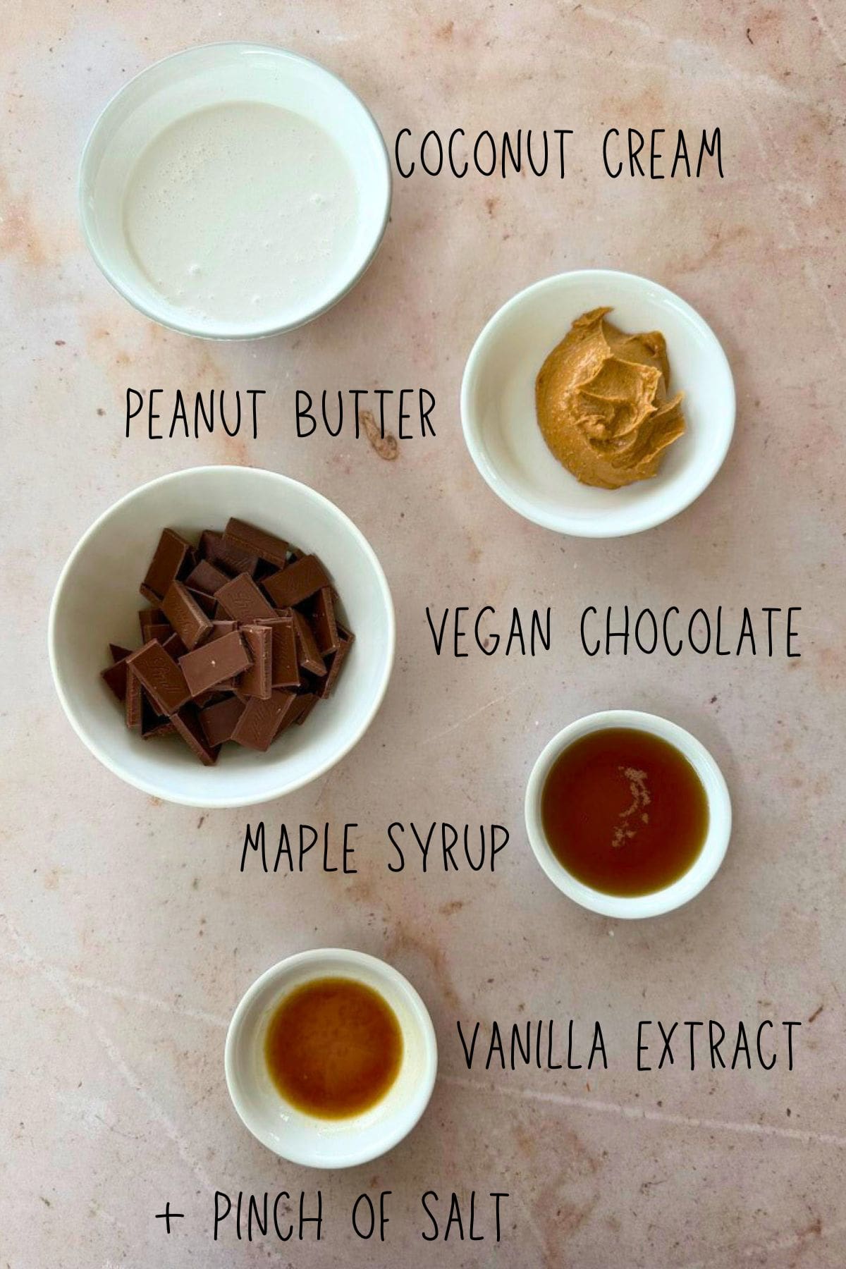 ingredients for vegan chocolate peanut butter fondue in bowls
