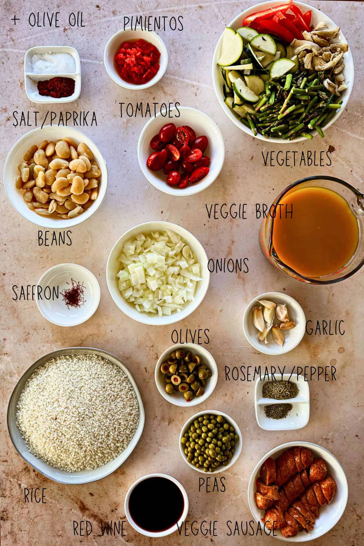 ingredients for vegan paella in bowls; top view.