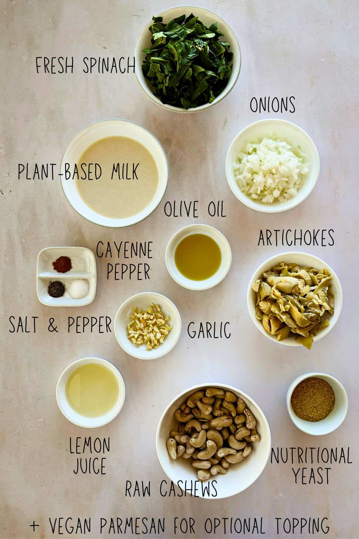 ingredients for vegan spinach artichoke dip in bowls; top view