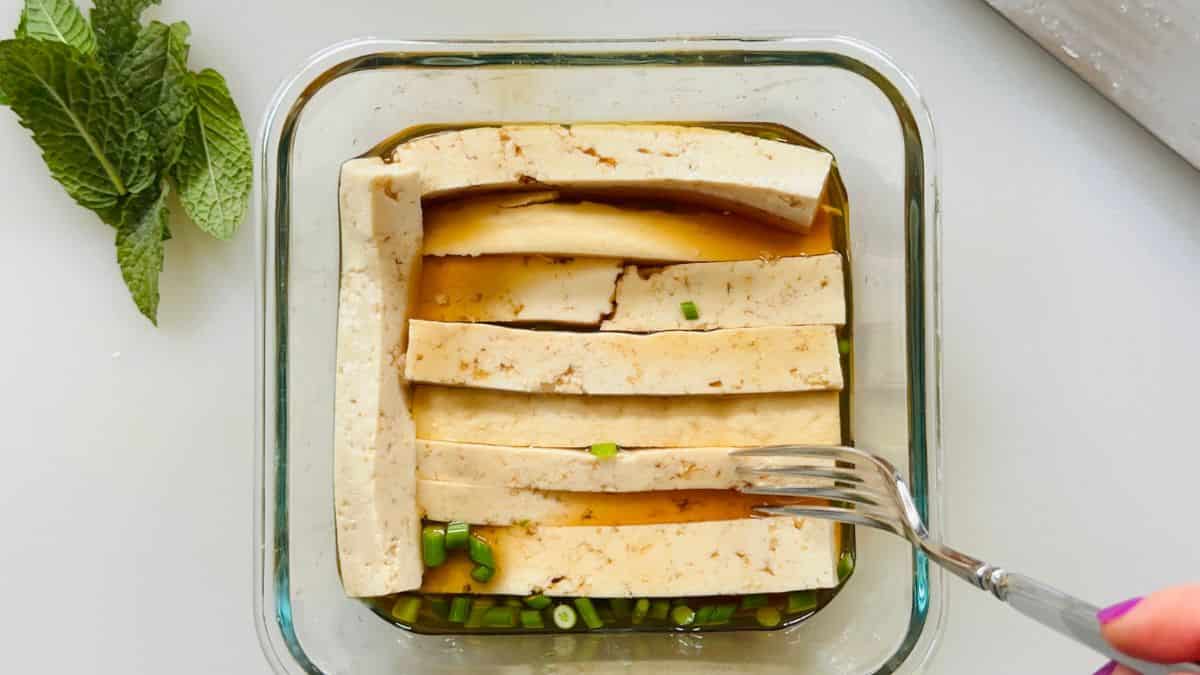marinating tofu in a glass container