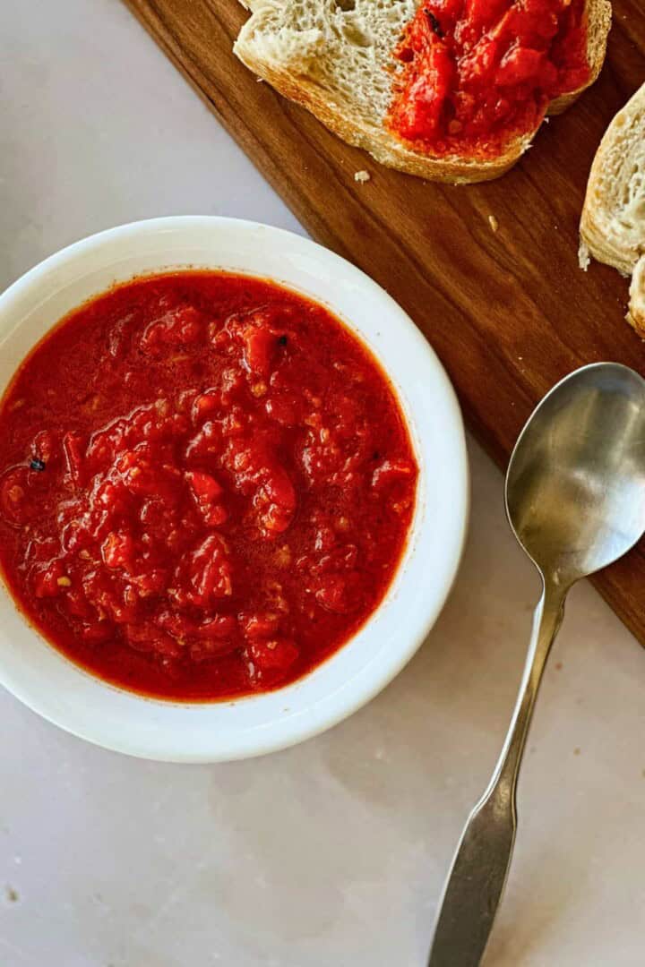 mojo picon in bowl surrounded with bread