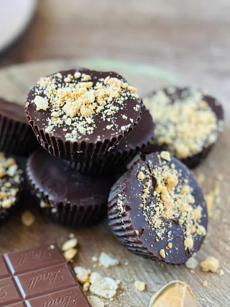 bunch of peanut butter cups on a plate