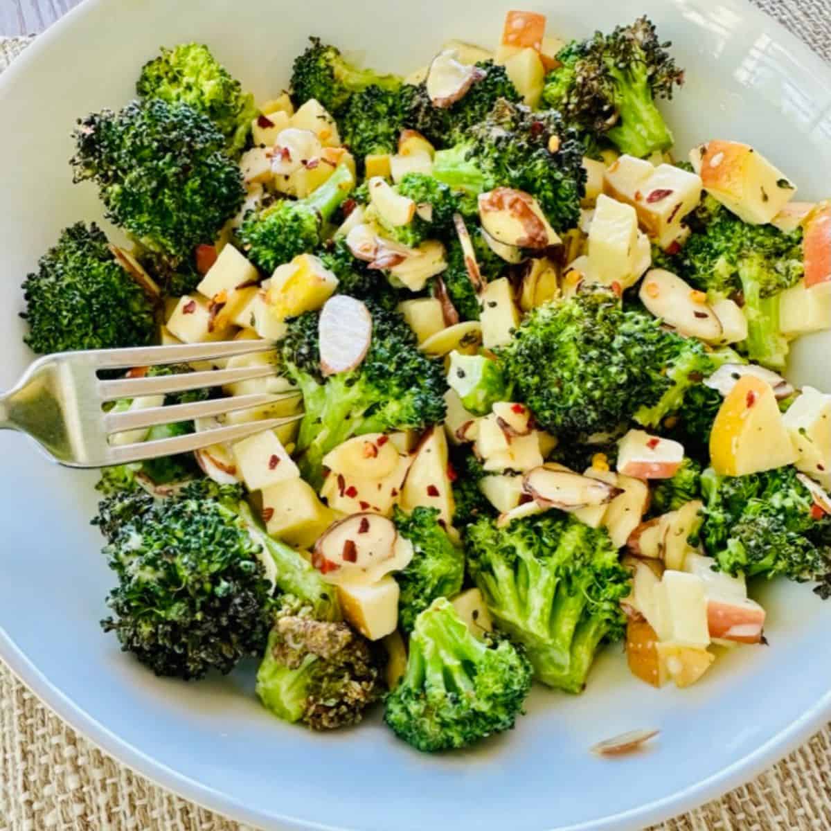 fork picking up roasted broccoli salad
