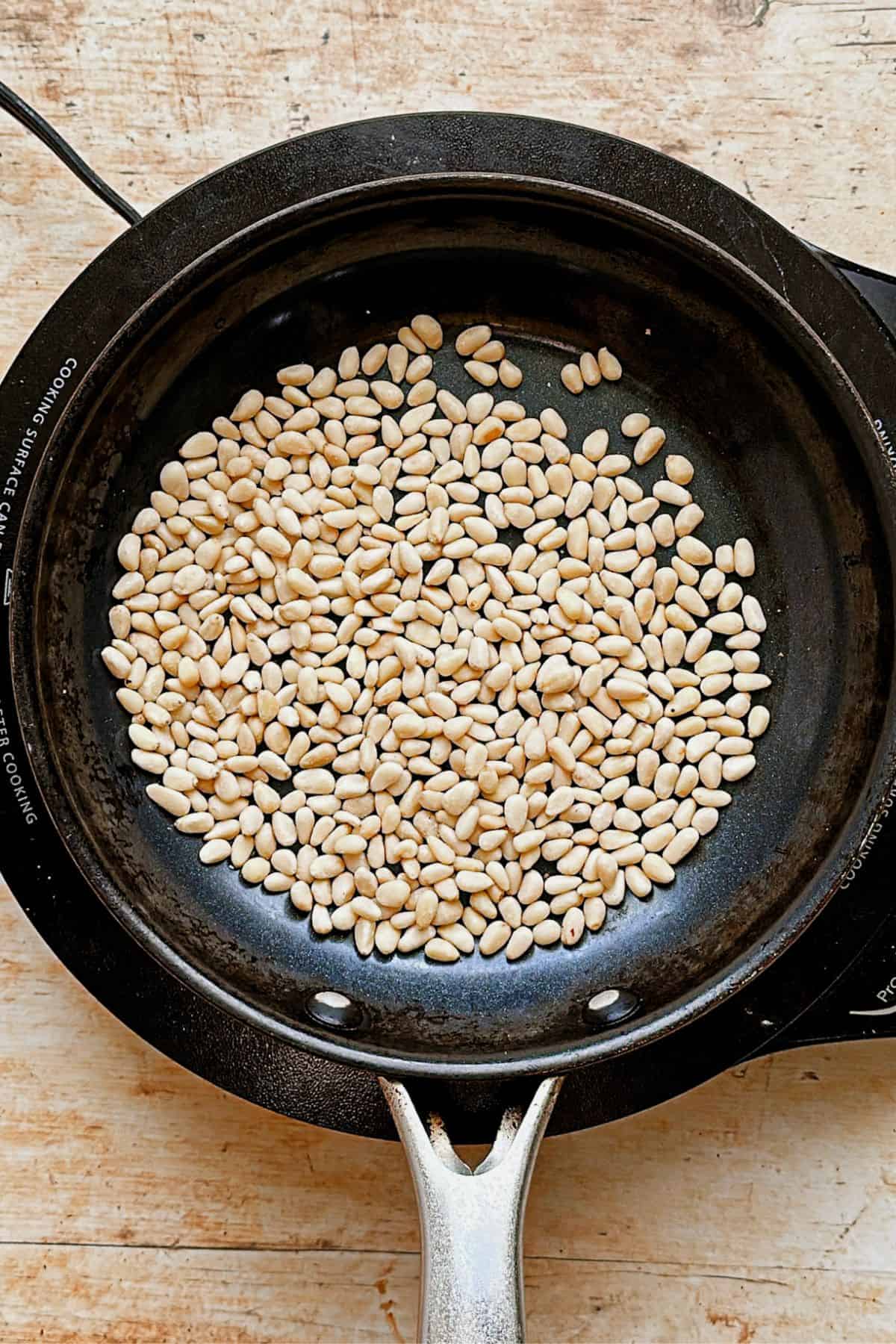 roasting pinenuts in a skillet