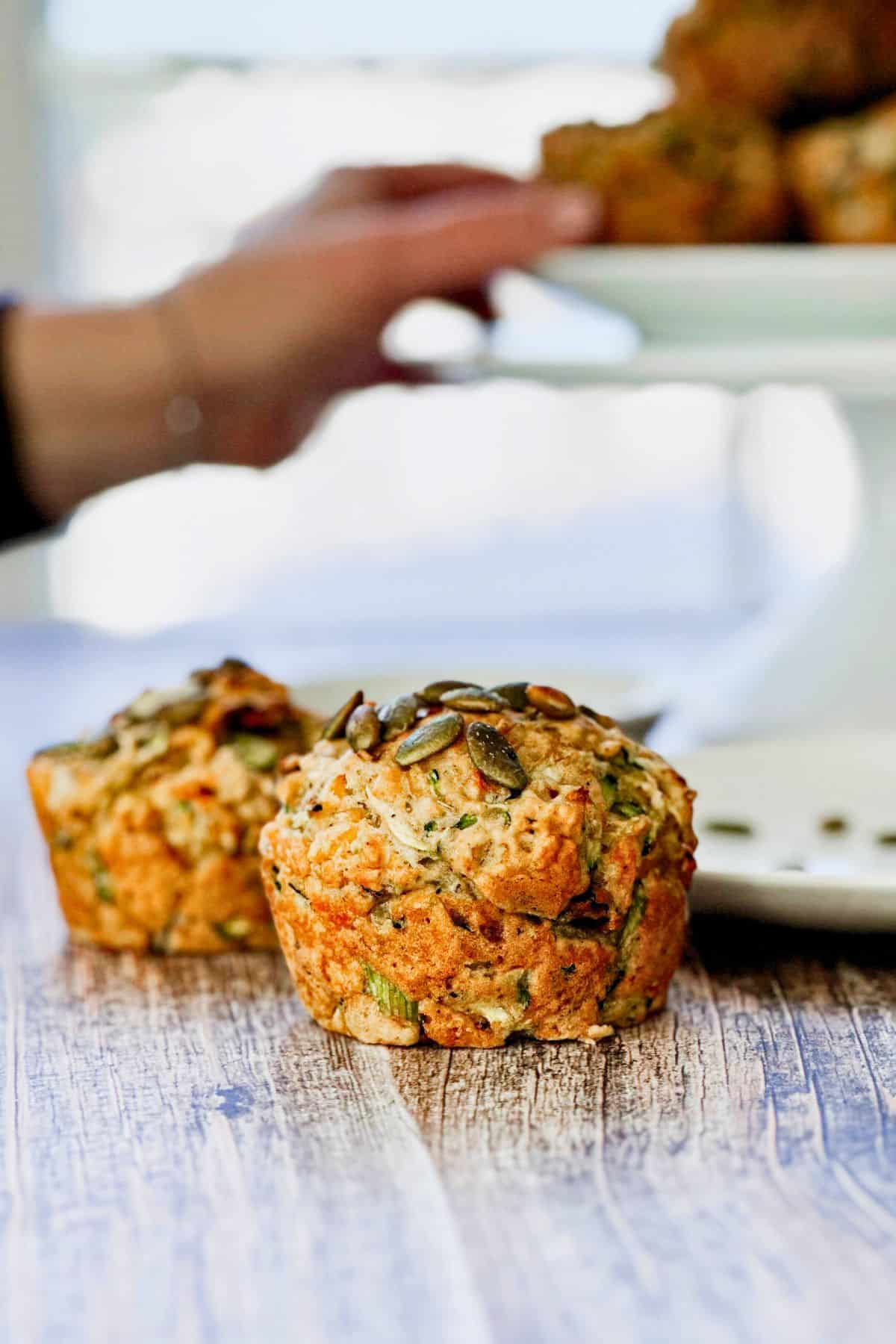 side view of savory vegan zucchini muffins