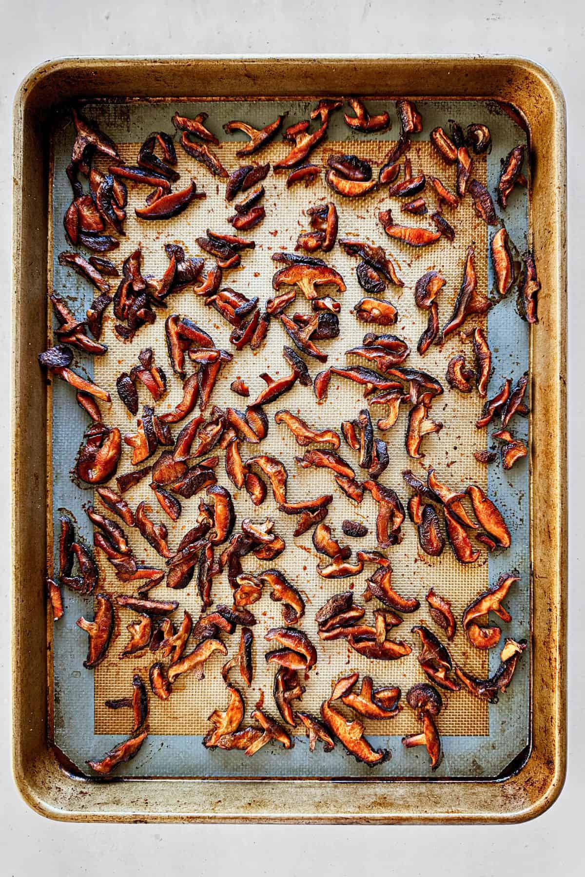 smoky glazed mushrooms on a baking pan after baking