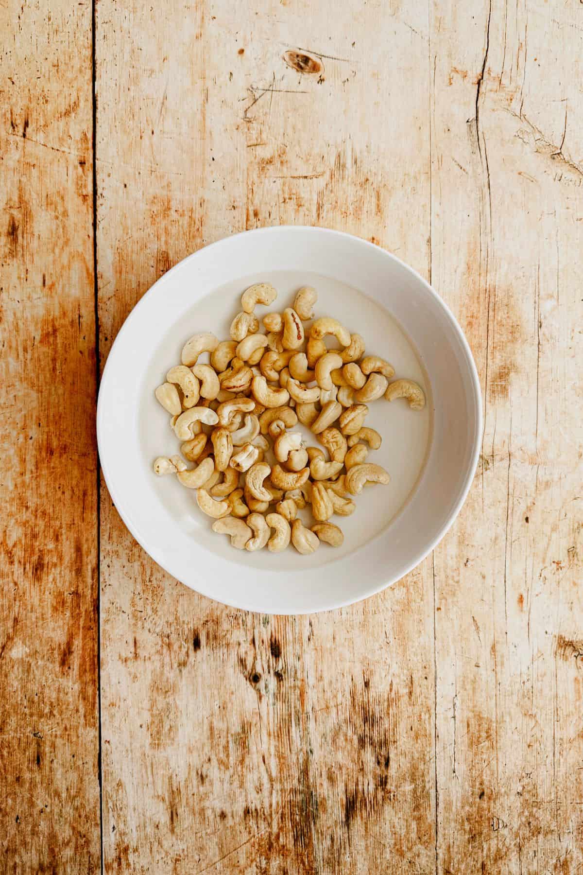 soaking cashews in a bowl