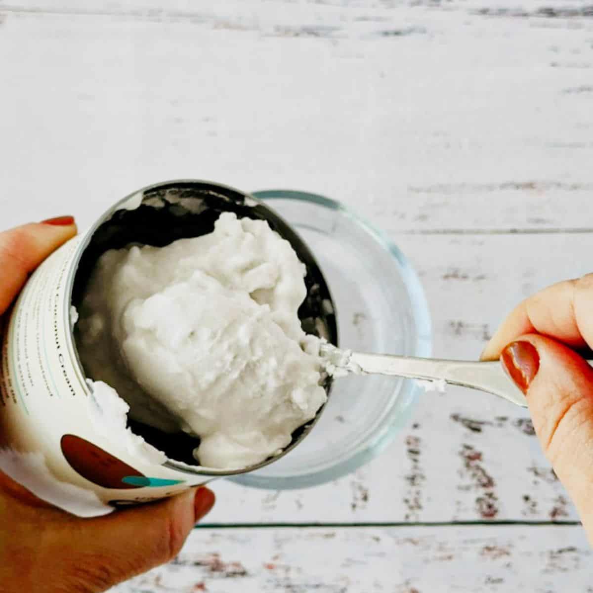 solidified coconut cream coming out of a can