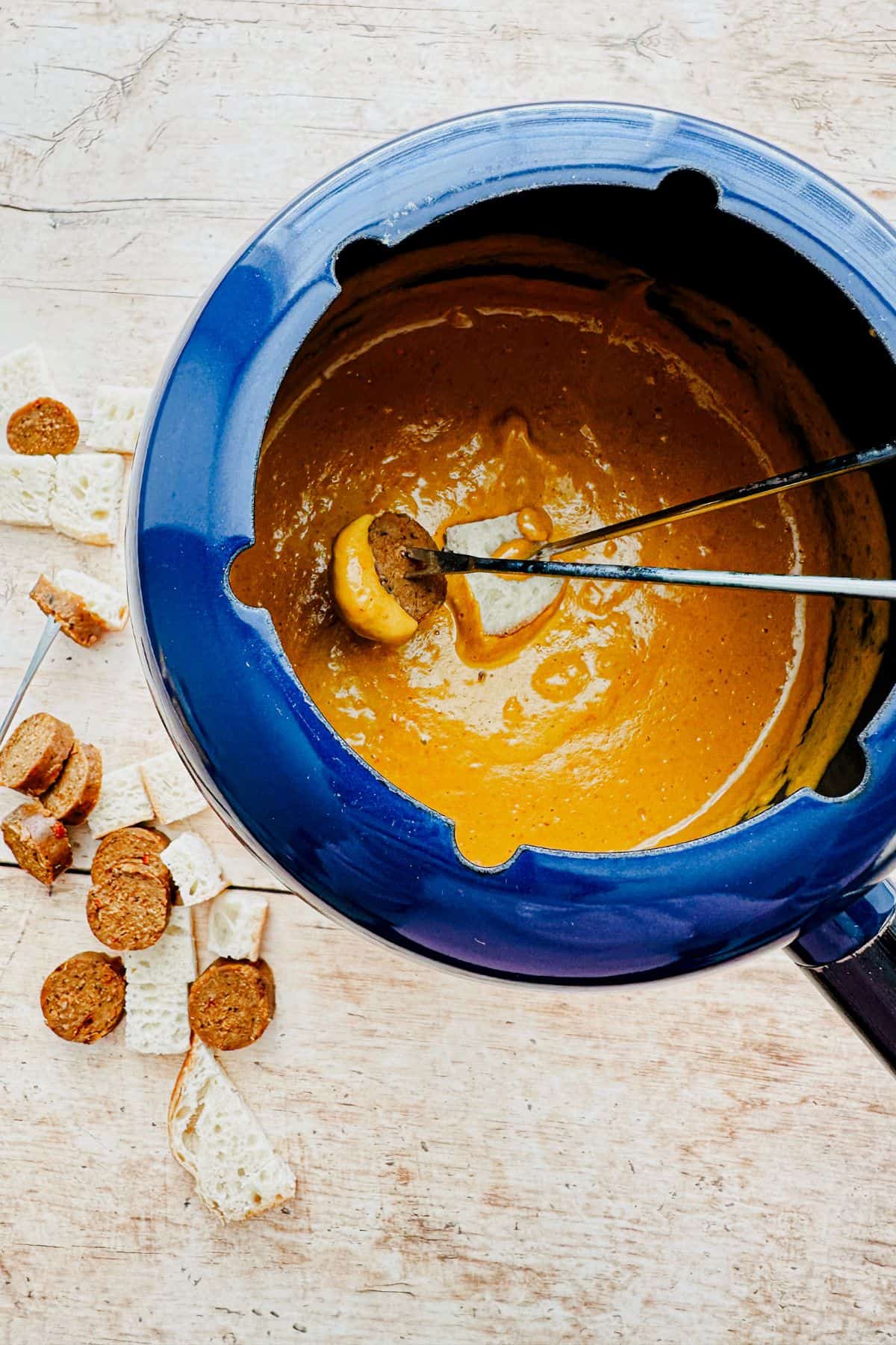 vegan cashew queso in a fondue pot