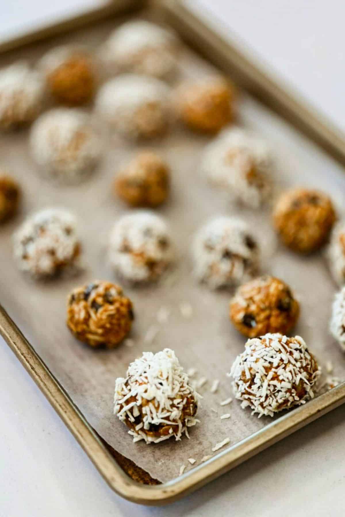 vegan chocolate chip energy balls on a baking tray