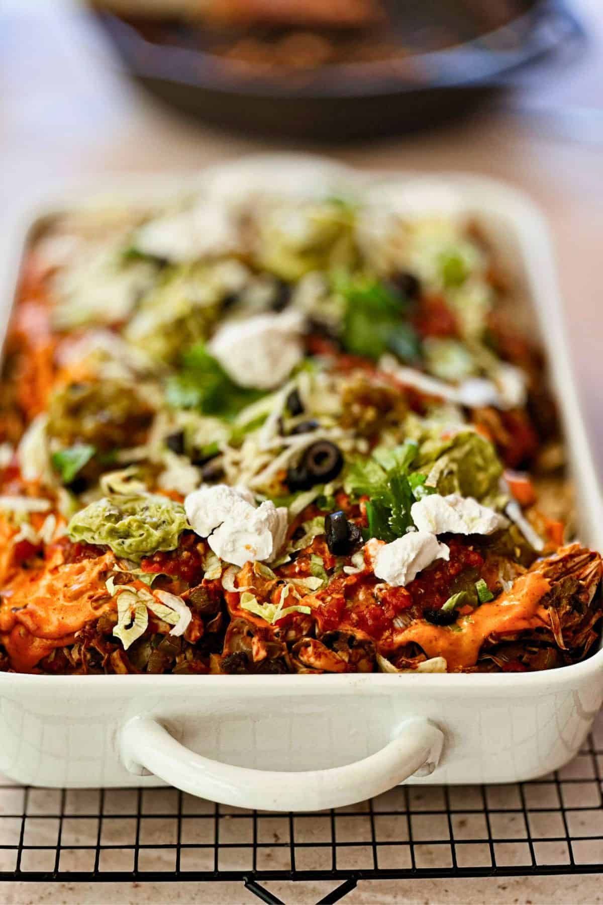 vegan jackfruit nachos in a baking sheet