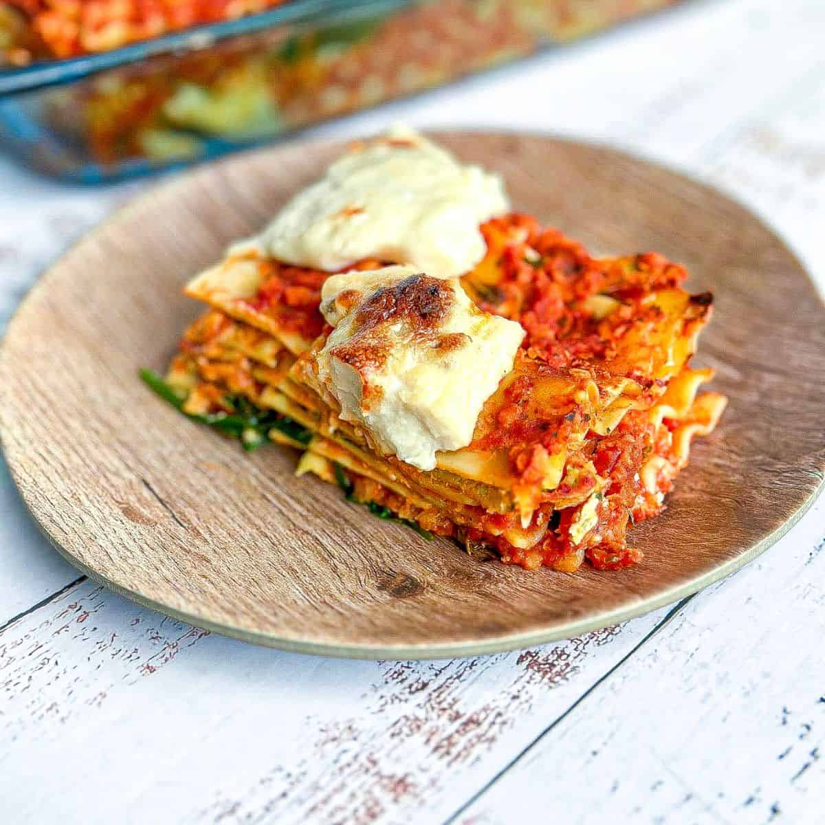 slice of vegan lasagna with homemade mozzarella
