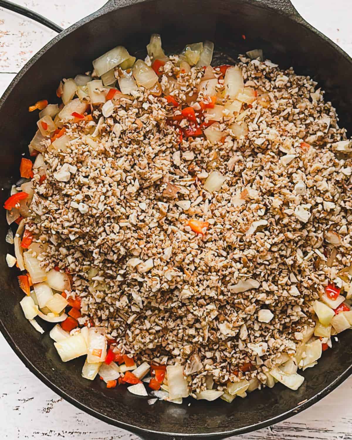 Step 4: mushrooms added to the pan of vegetables