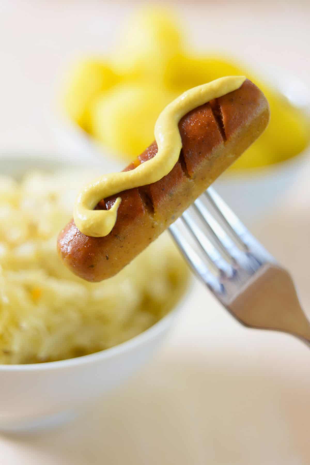 vegan sausage with mustard