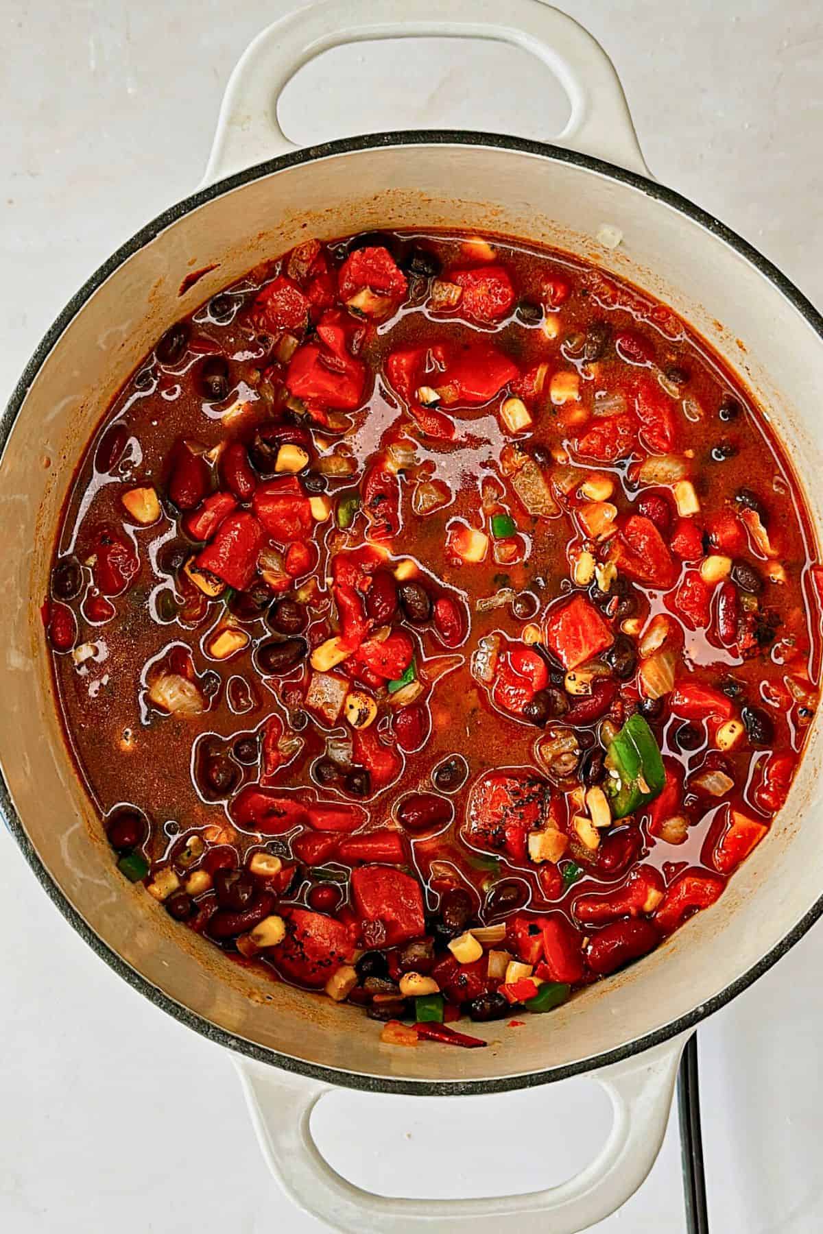 vegan tortilla soup in dutch oven pot; top view