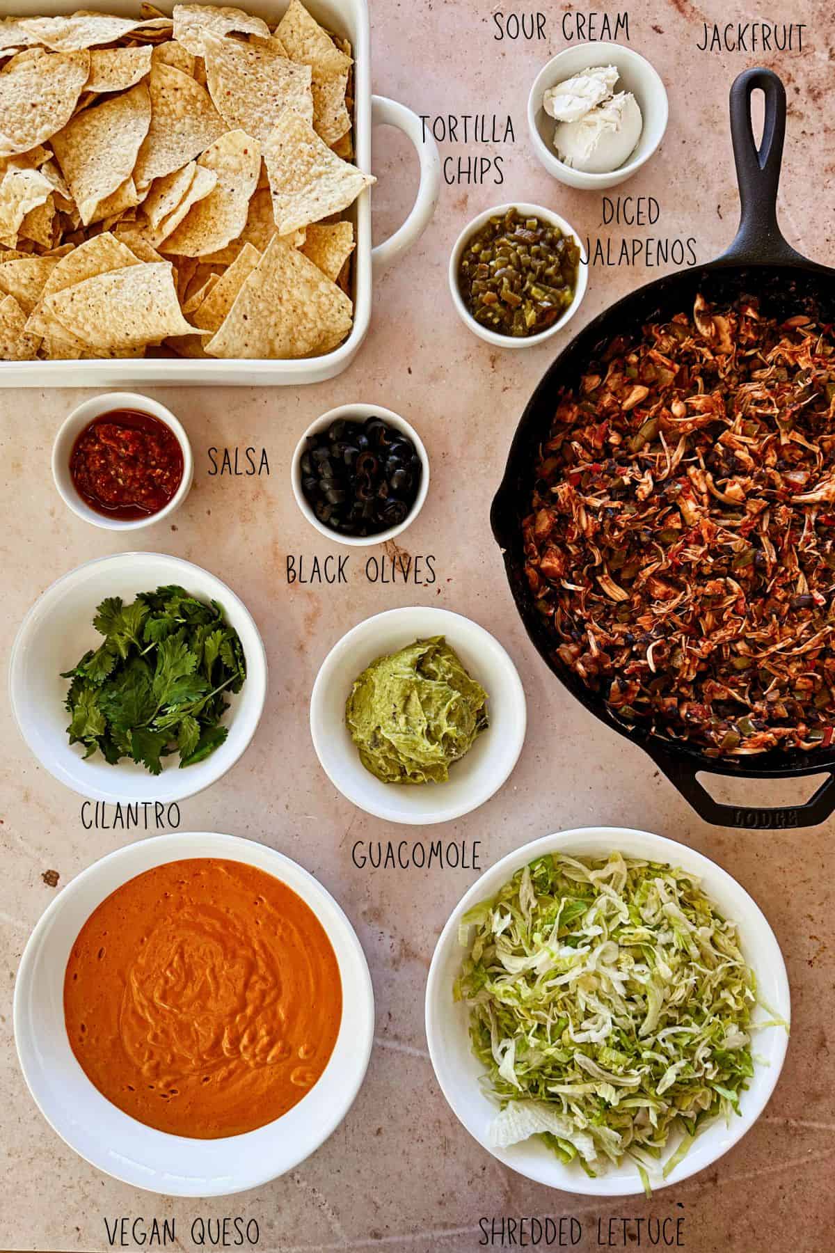 vegan jackfruit nachos ingredients (3) ingredients for vegan jackfruit nachos in bowls.