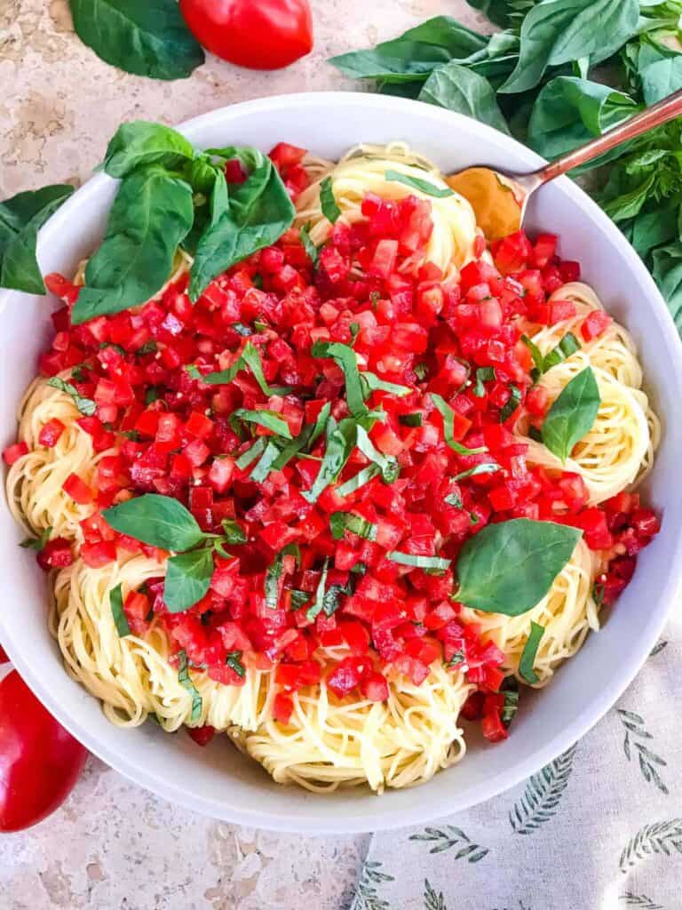 plate of copycat olive garden capellini pomodoro tomato pasta