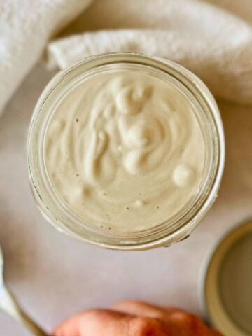 top view of cashew cream in a mason jar.