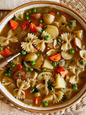 Top view of a bowl of Pennsylvania Dutch Pot Pie with a spoon inside the dish.