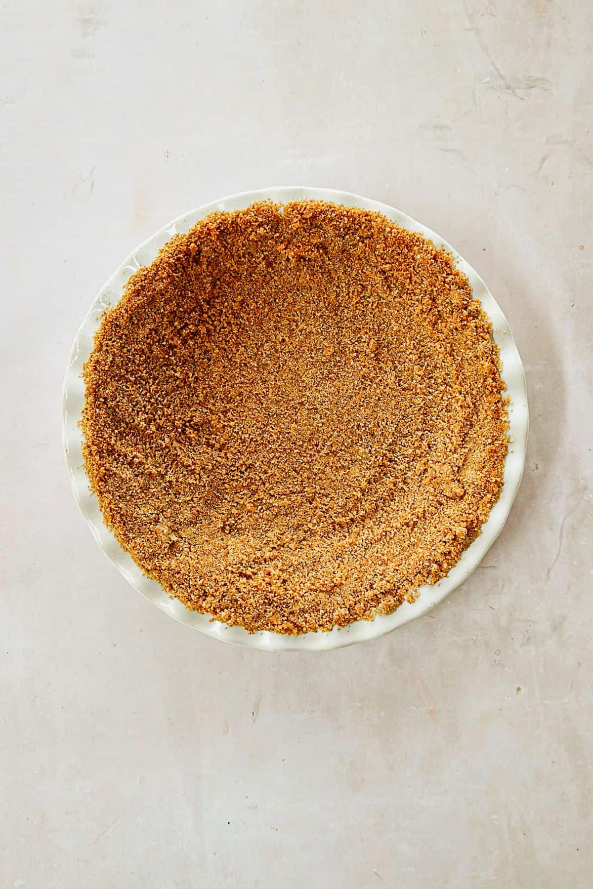 top view of prepared graham cracker pie crust.