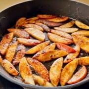 caramelized apples in a pan.