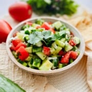 cucumber pico de gallo also known as salsa fresca in a bowl.