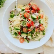 bowl of angel hair pasta salad.