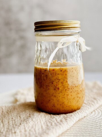homemade Italian vinaigrette in a jar.