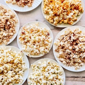 seasoned popcorn on plates.