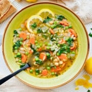 bowl of Lemony Orzo Chickpea Soup.