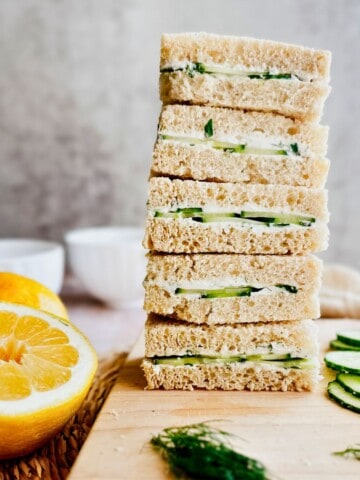 stack of vegan cucumber sandwiches.