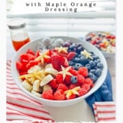 pin for the red white blue fruit salad showing the salad in a white bowl.