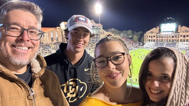 picture of the pearce family at a stadium.