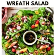 Pin graphic reading ‘How to Make A Christmas Wreath Salad’ above a wreath-shaped salad with a bowl of dressing in the center.