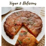 Two-Potato Anna on a plate with a slice removed, showing crispy layered potatoes, with text reading ‘How to Make Two Potato Anna – Vegan & Delicious.’