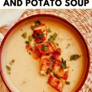 Graphic with the text “How to Make Roasted Garlic and Potato Soup” at the top. Below the title, a bowl of creamy roasted garlic and potato soup is topped with golden croutons and chopped parsley.