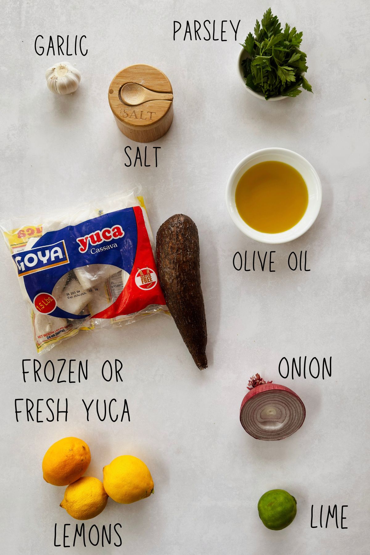 Ingredients for yuca con mojo: fresh or frozen yuca, garlic, parsley, salt, olive oil, onion, lemons, and lime.